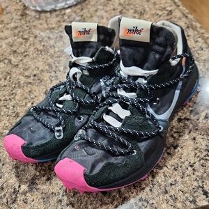 Nike Black and Pink Athletic Shoes with Rugged Design